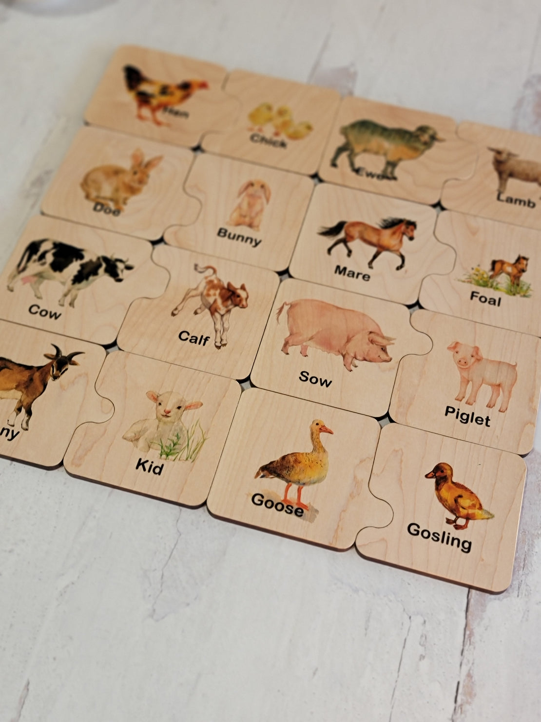 Wooden puzzle, farm mother and baby