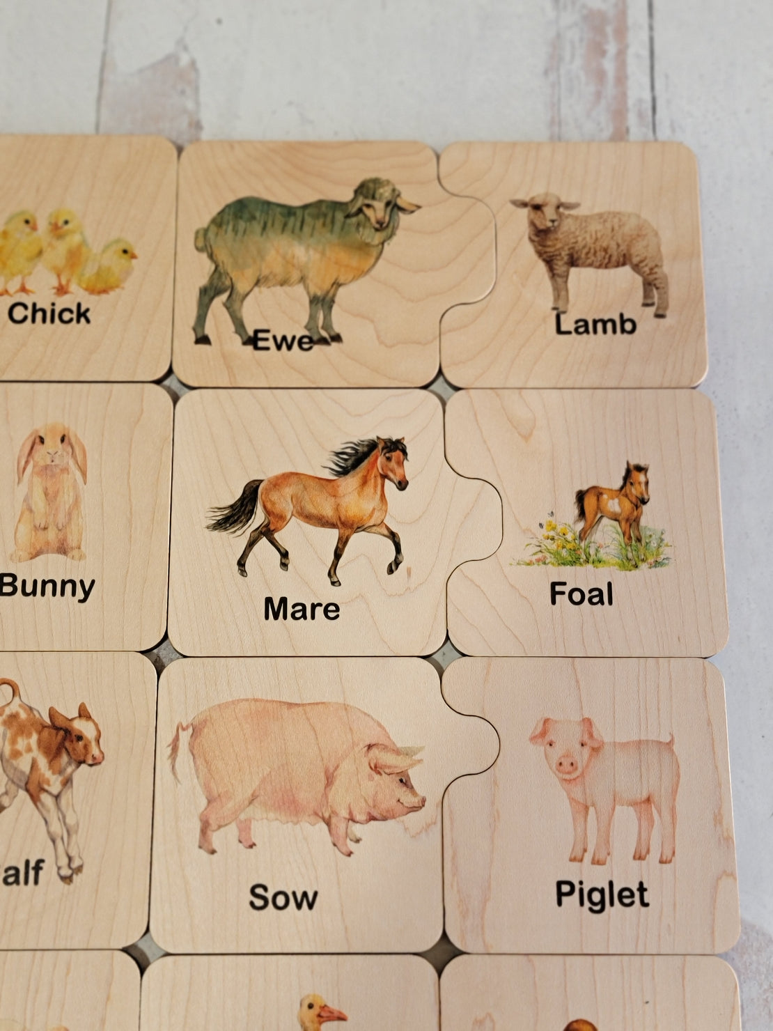 Wooden puzzle, farm mother and baby