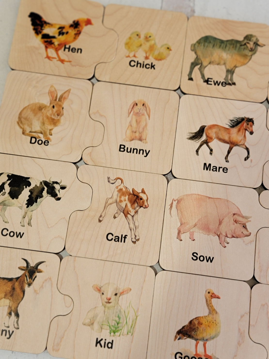 Wooden puzzle, farm mother and baby